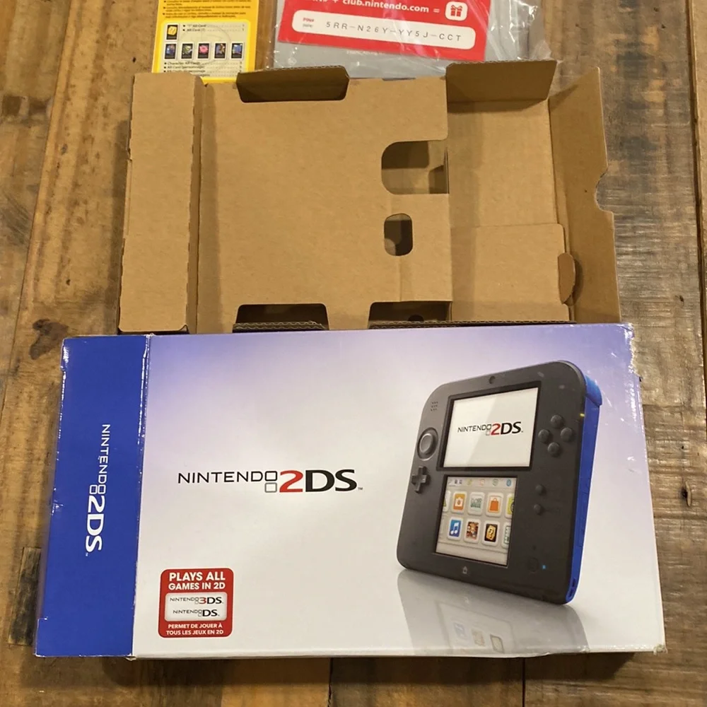 Nintendo DS electric blue box with instructions. No game console